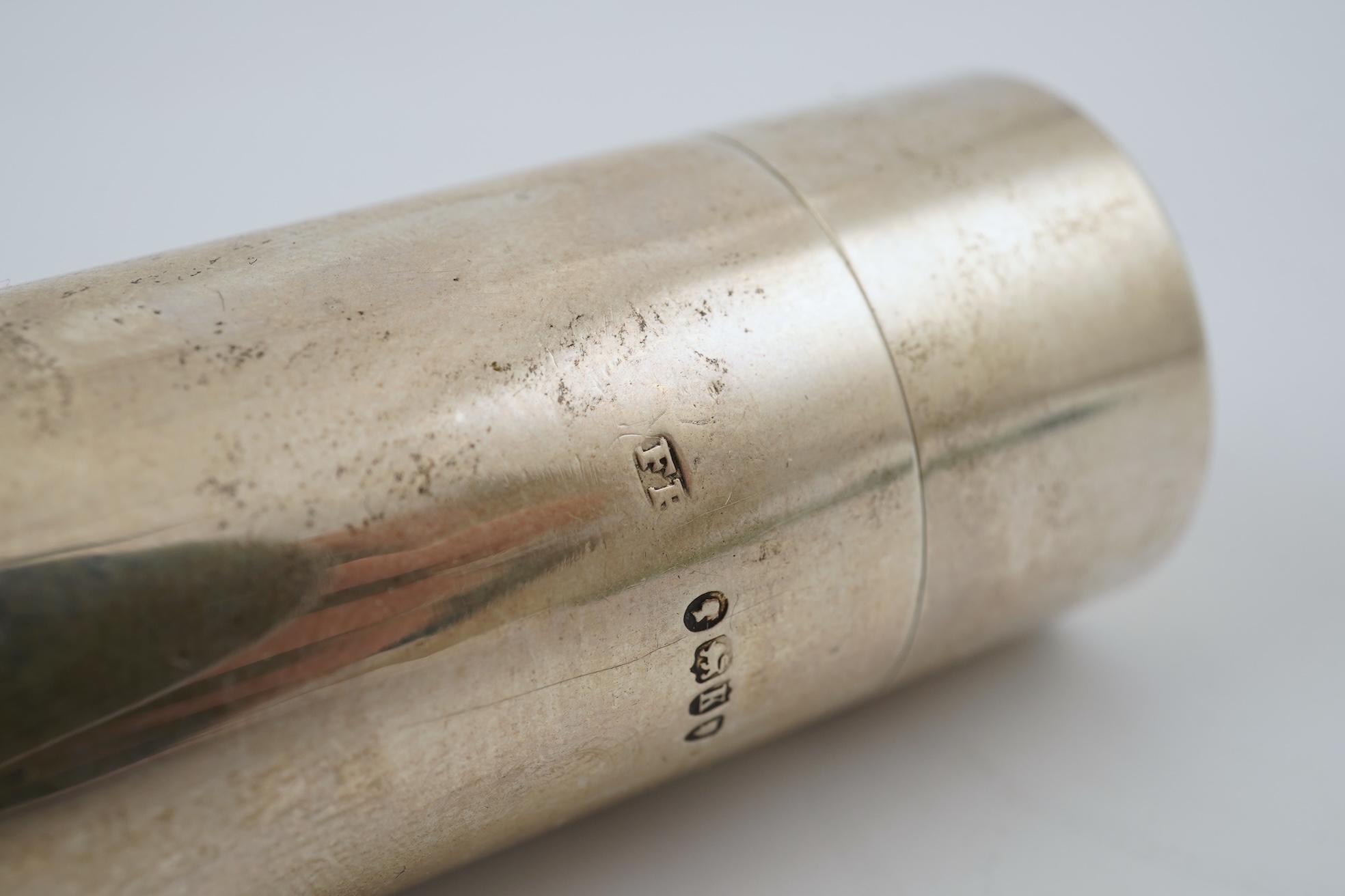 A late Victorian parcel gilt silver tubular coin holder, by Frederic Purnell